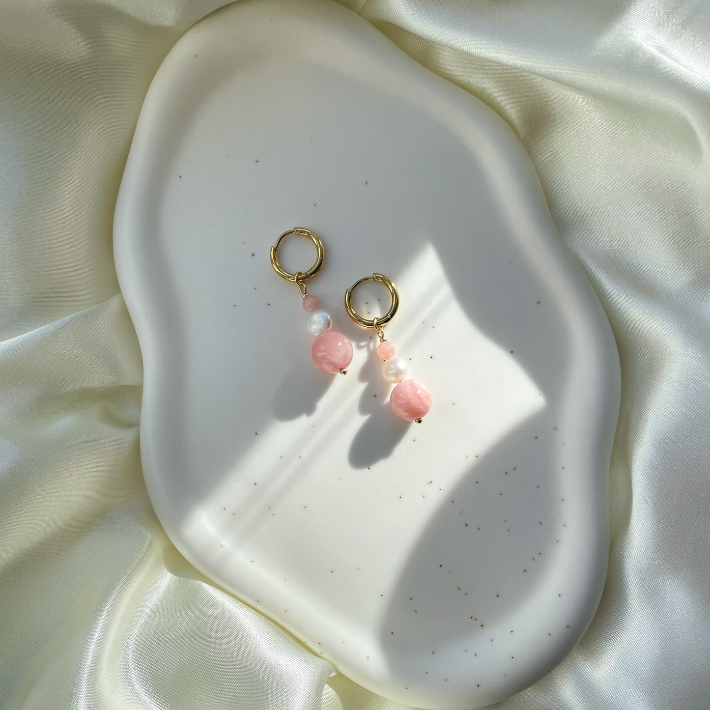 Hanging pearl earrings