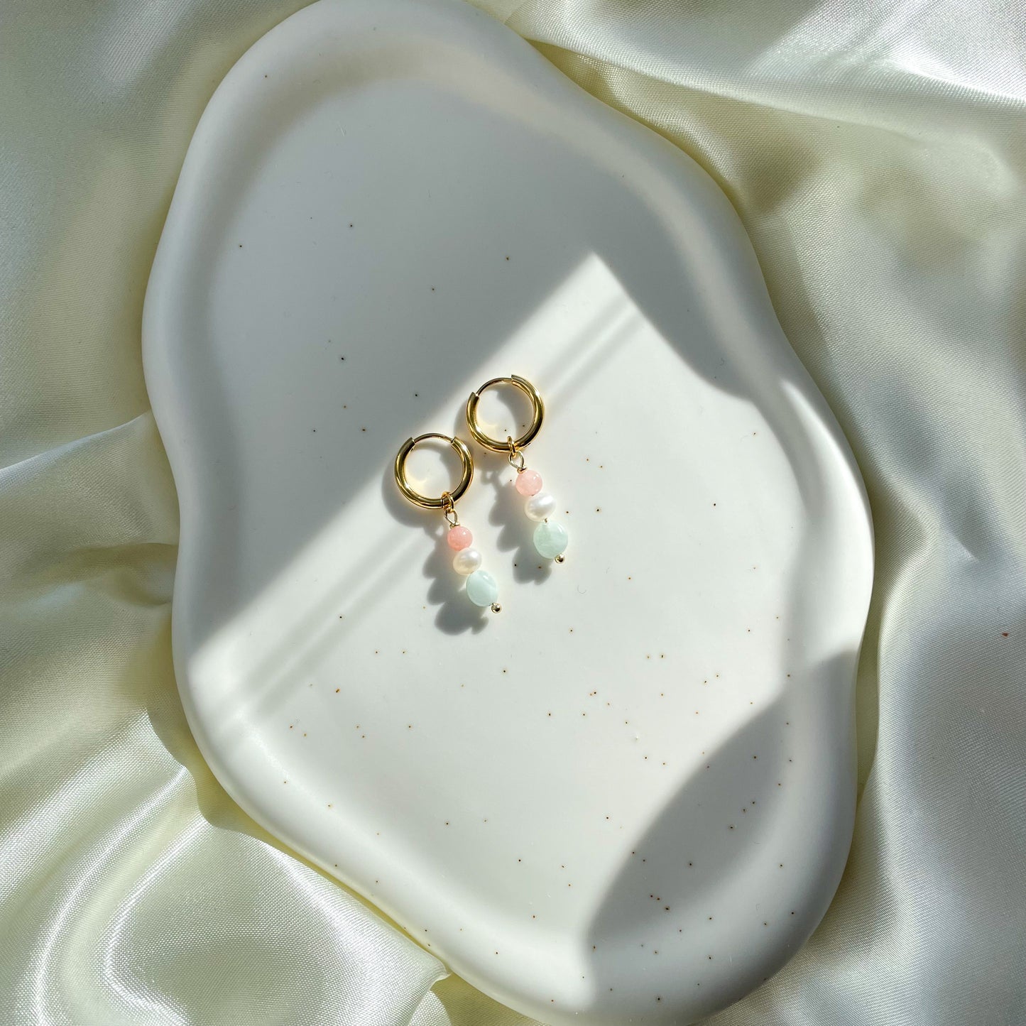 Hanging pearl earrings