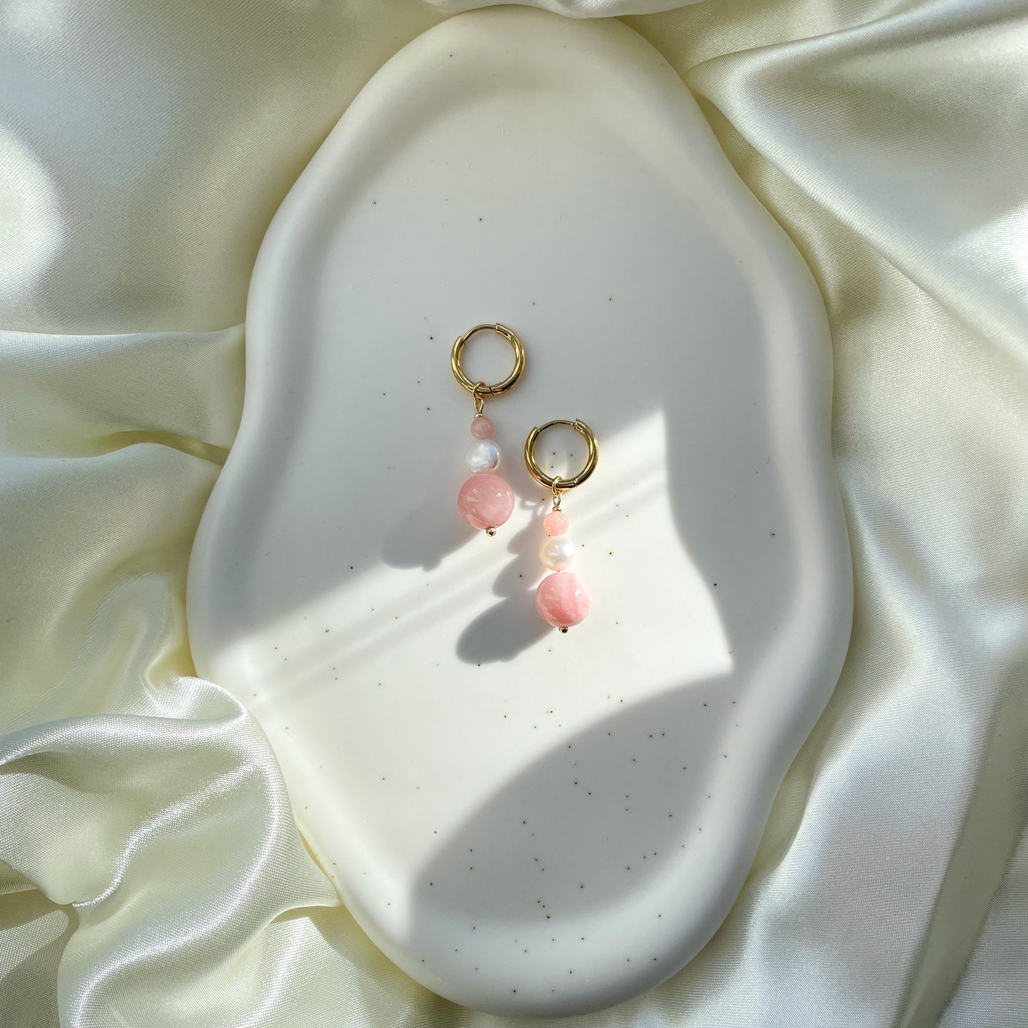 Hanging pearl earrings